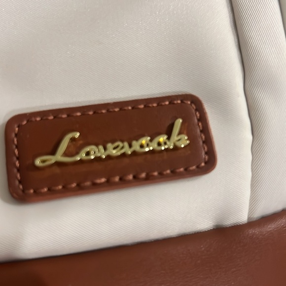 NWOT Cream and Brown Backpack with USB port. - Picture 12 of 12